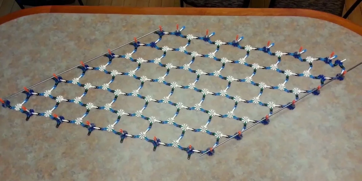 A new metamaterial, recreated here using K'Nex, can change its softness and hardness in response to low-level stress