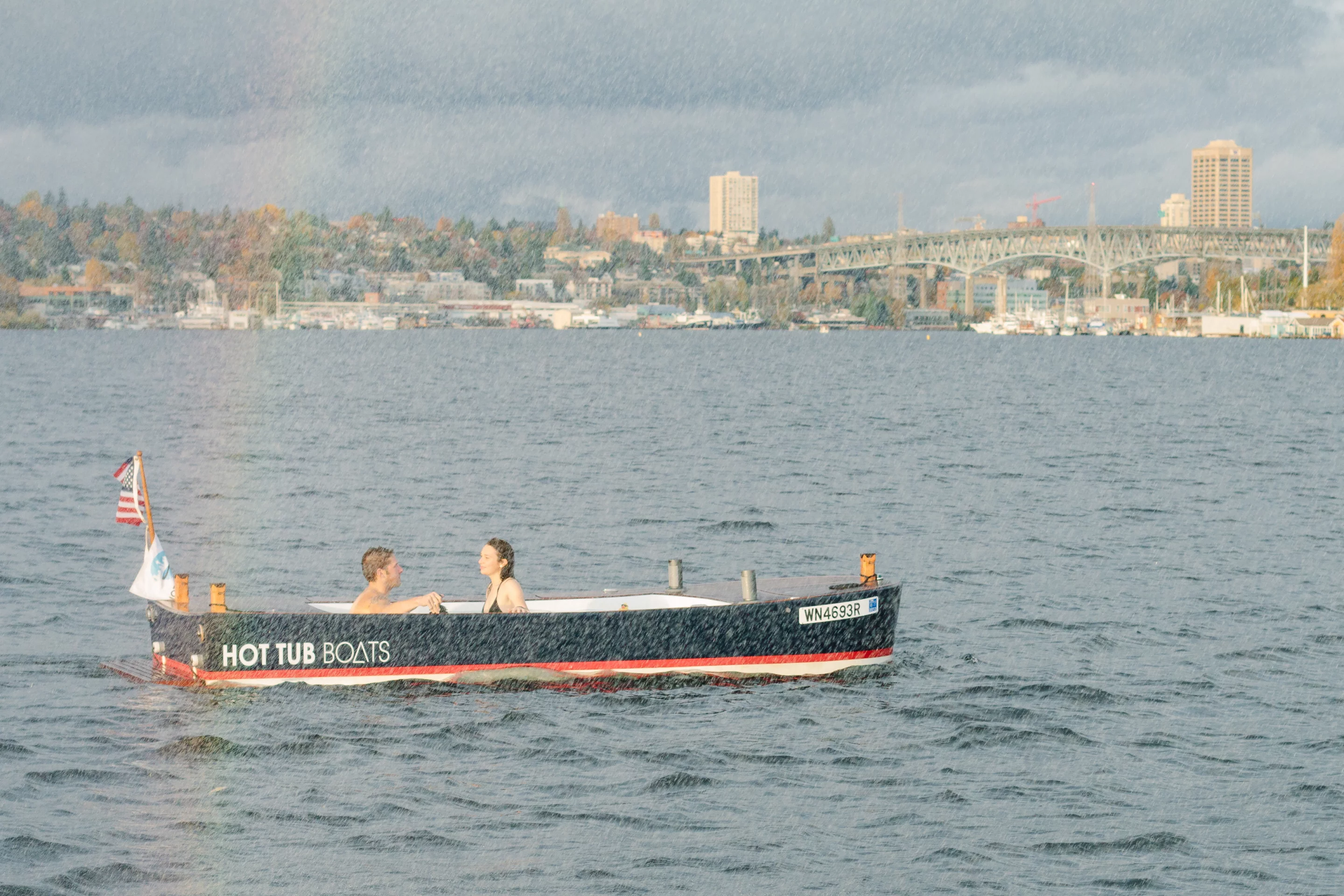The Hot Tub Boat allows its passengers to soak while they cruise