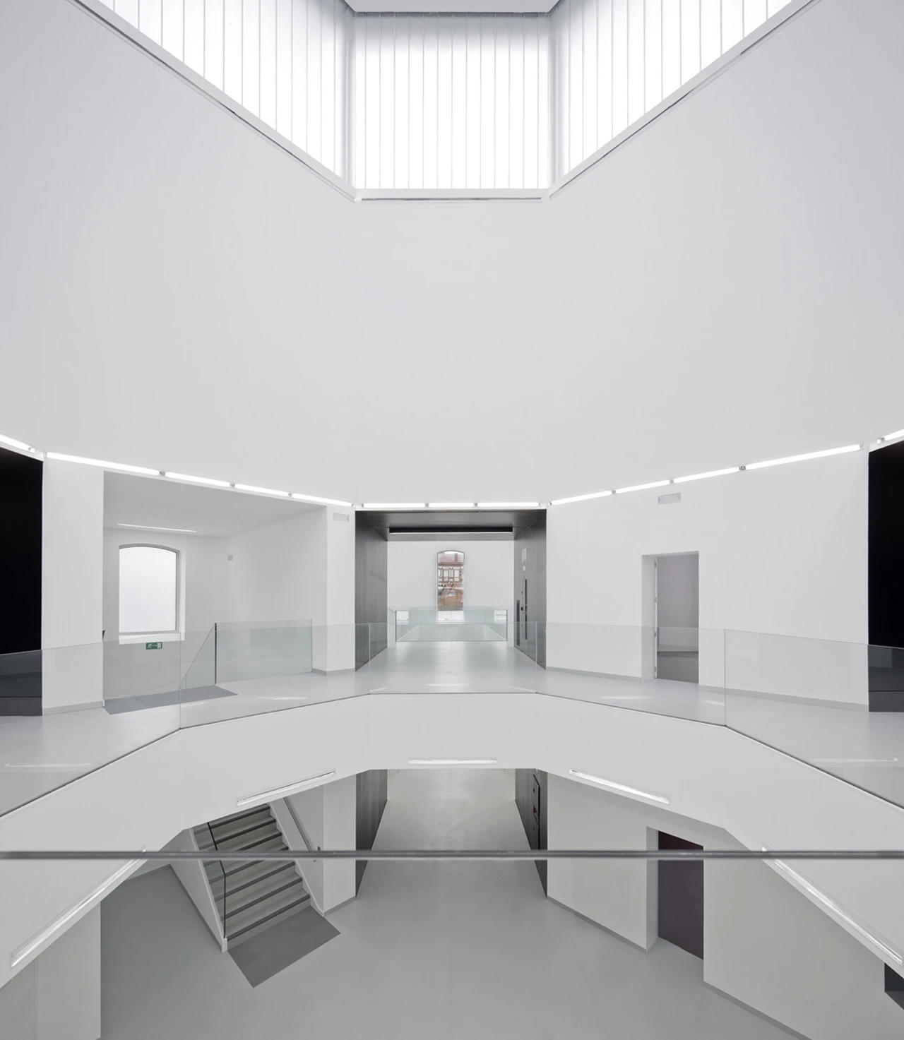 Inside is clean, white and utilitarian