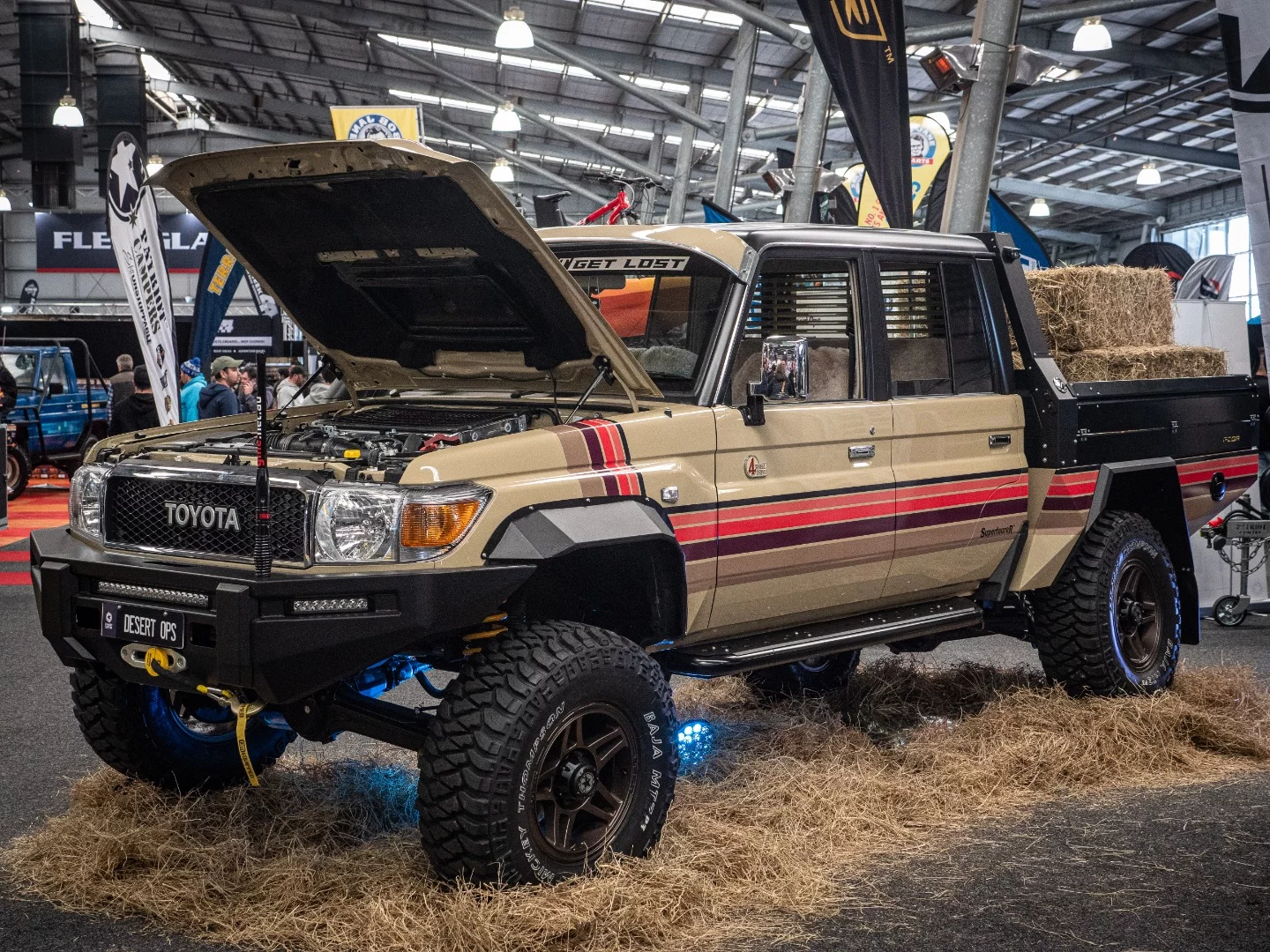 The retro theme continues with Patriot's Land Cruiser-based Desert Ops Supertourer