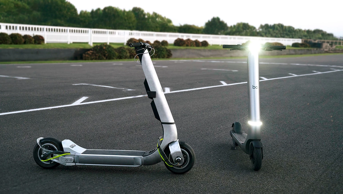 The Turbo (left) shares the non-folding aluminum chassis of the Model M (right), but features a different powertrain, battery, and bodywork for cooling the internals
