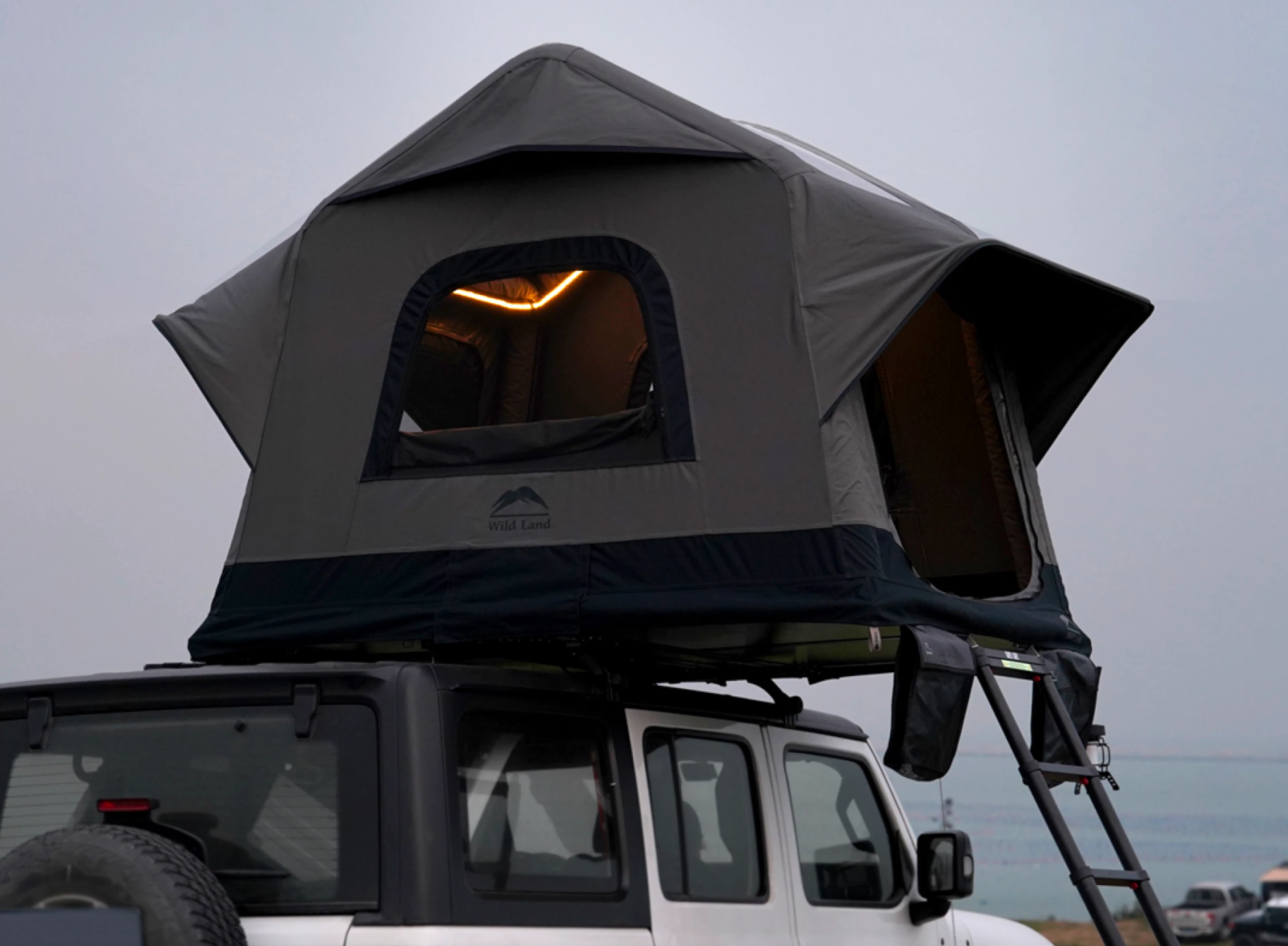 Air Cruiser inflatable rooftop tent pops up with the push of a button