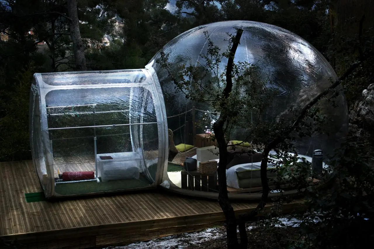 A hotel in France is offering guests the chance to stay in fully-furnished, clear-plastic bubbles and sleep amongst nature