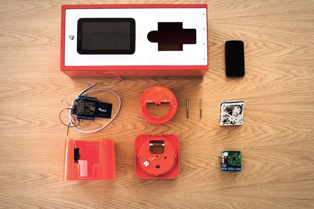The components of the Digital Gum Machine developed by the Razor Emerging Experiences team - including a Samsung Galaxy Tab, an Adafruit NFC shield, a simple reed switch and two Arduino microcontrollers