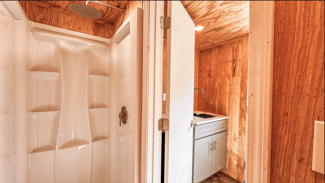 The Element 20's bathroom is small and simple, with a shower and toilet