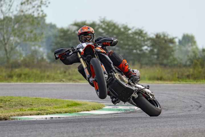 Um, he's doing that... AND looking at the camera.