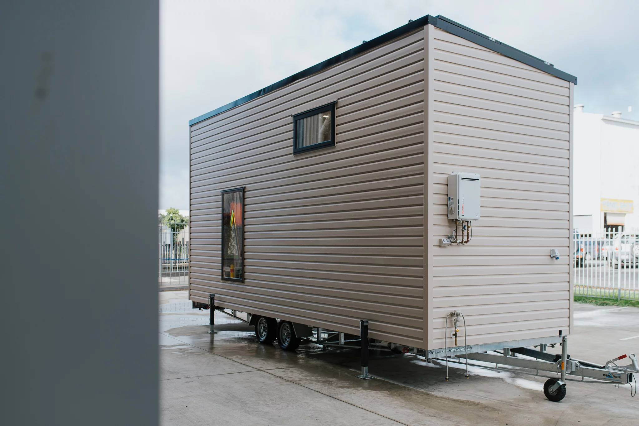 The Daisy Vera Tiny House features a vinyl exterior