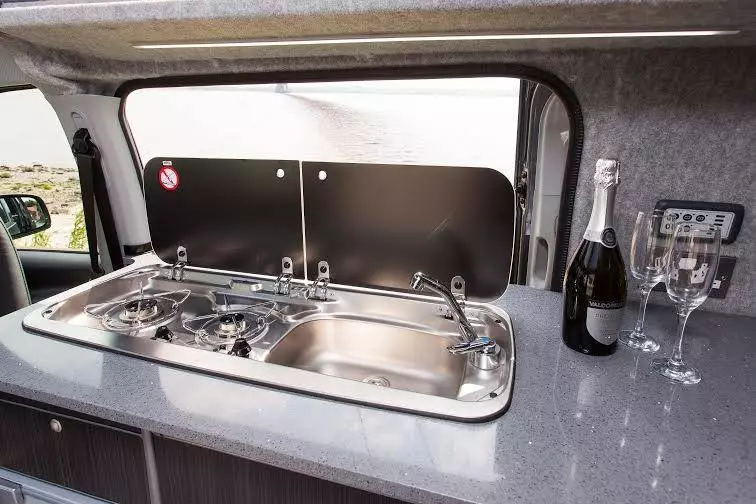 The Smev sink/stove unit includes a glass cover