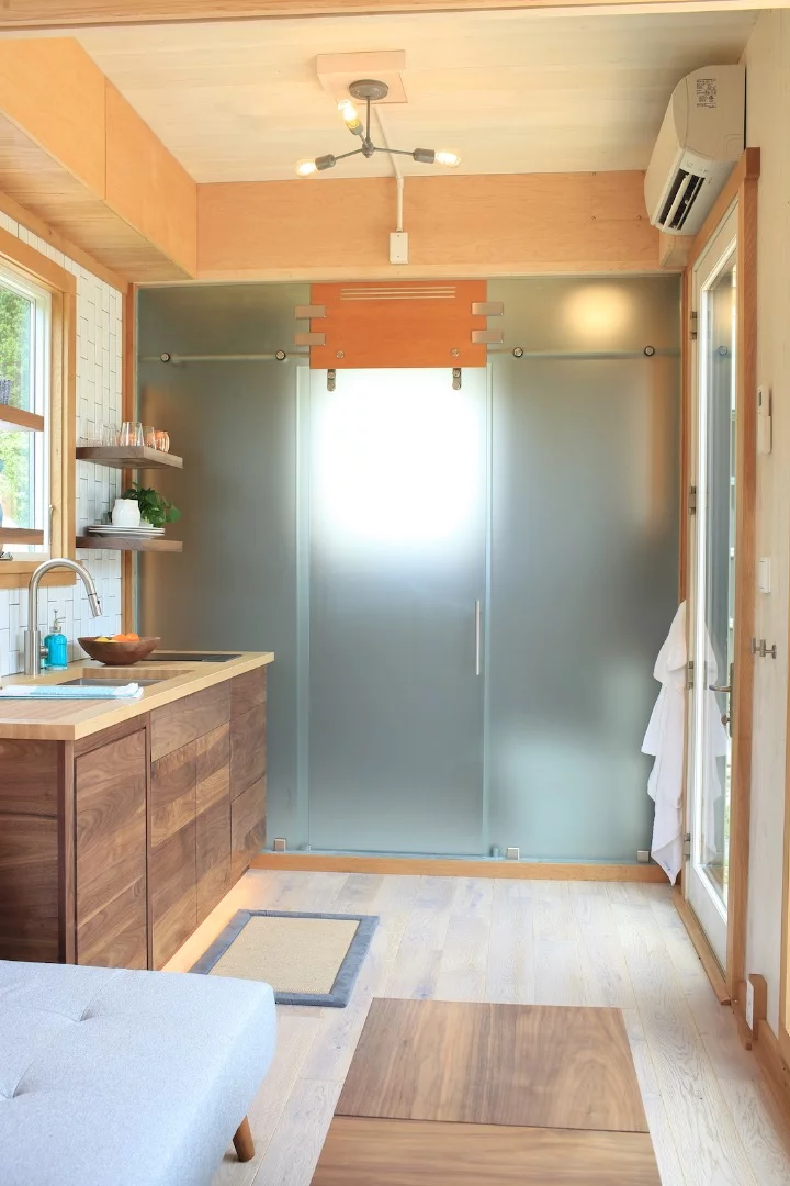 The Sturgis' small bathroom includes shower and toilet (that semi-transparent glass is also optional)