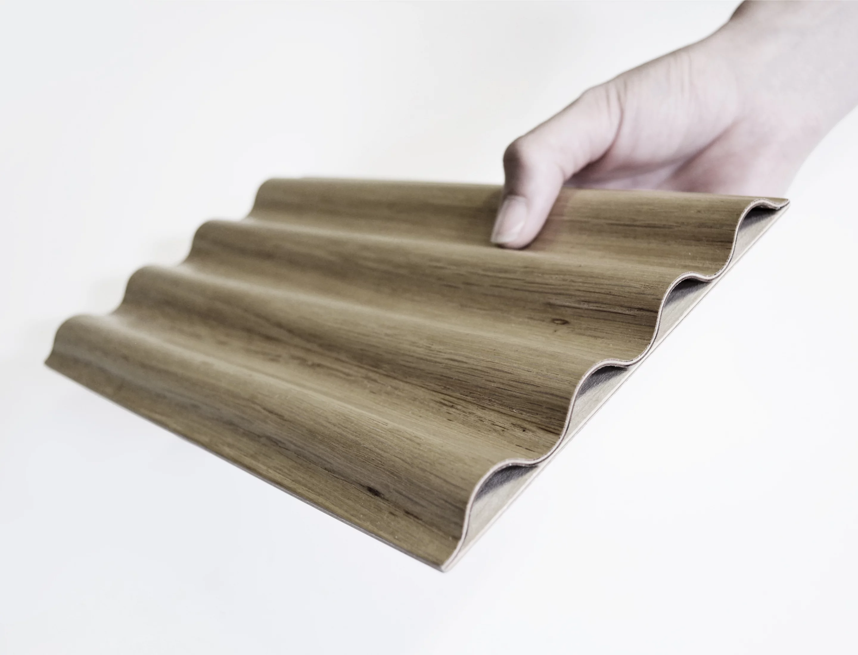 An example of the corrugated plywood created via pressure lamination