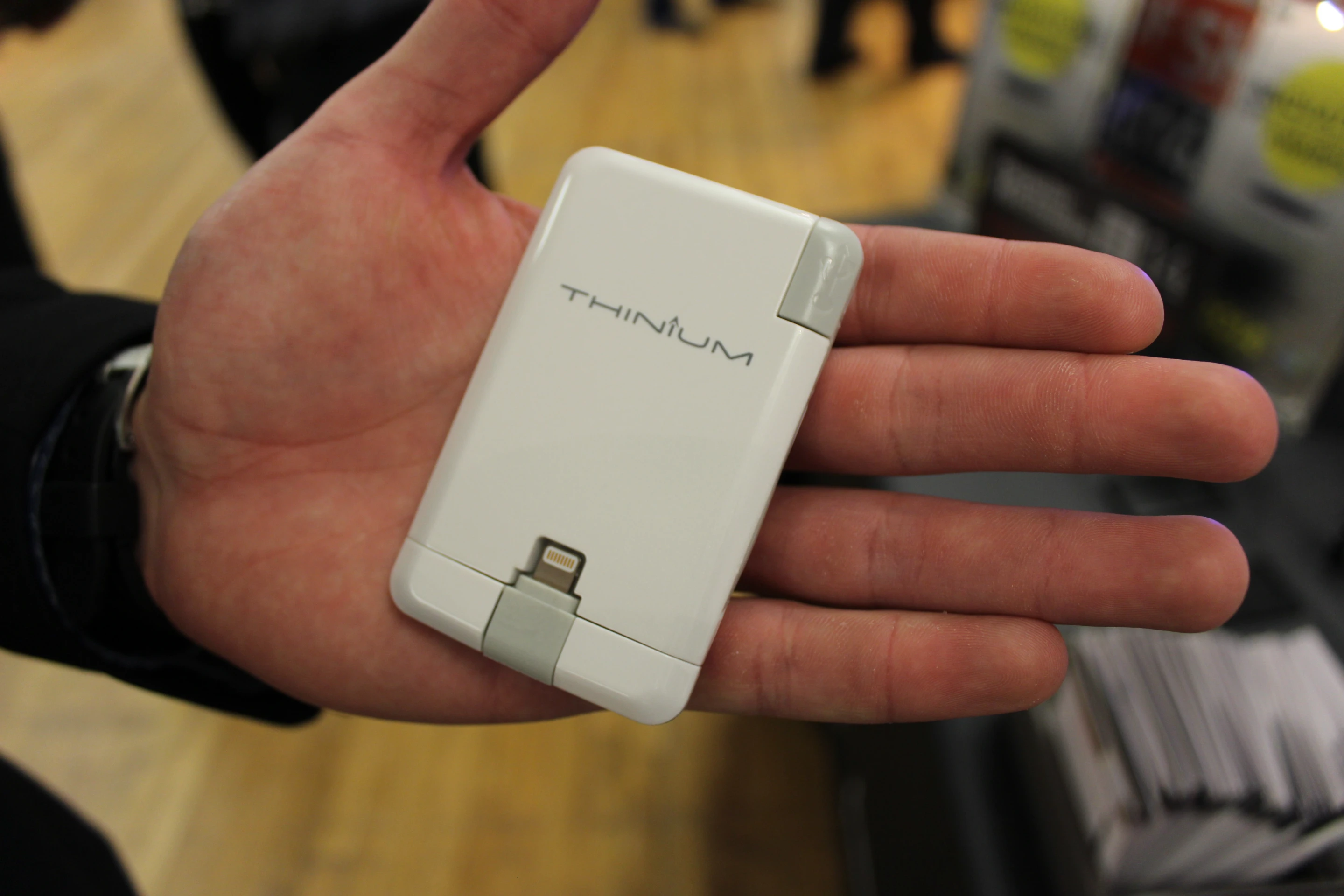The Thinium Charge fits in a wallet when not in use