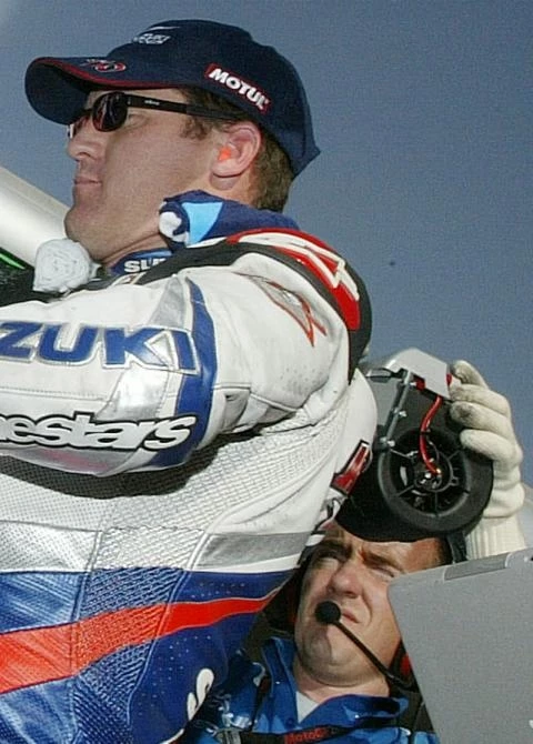 Click image to enlargeKenny Roberts with one of Alpine Stars new prototype systems working away - the system is designed to lower the rider's temperature via a seat (see Nicky Hayden pic) and keep the rider cool on the grid