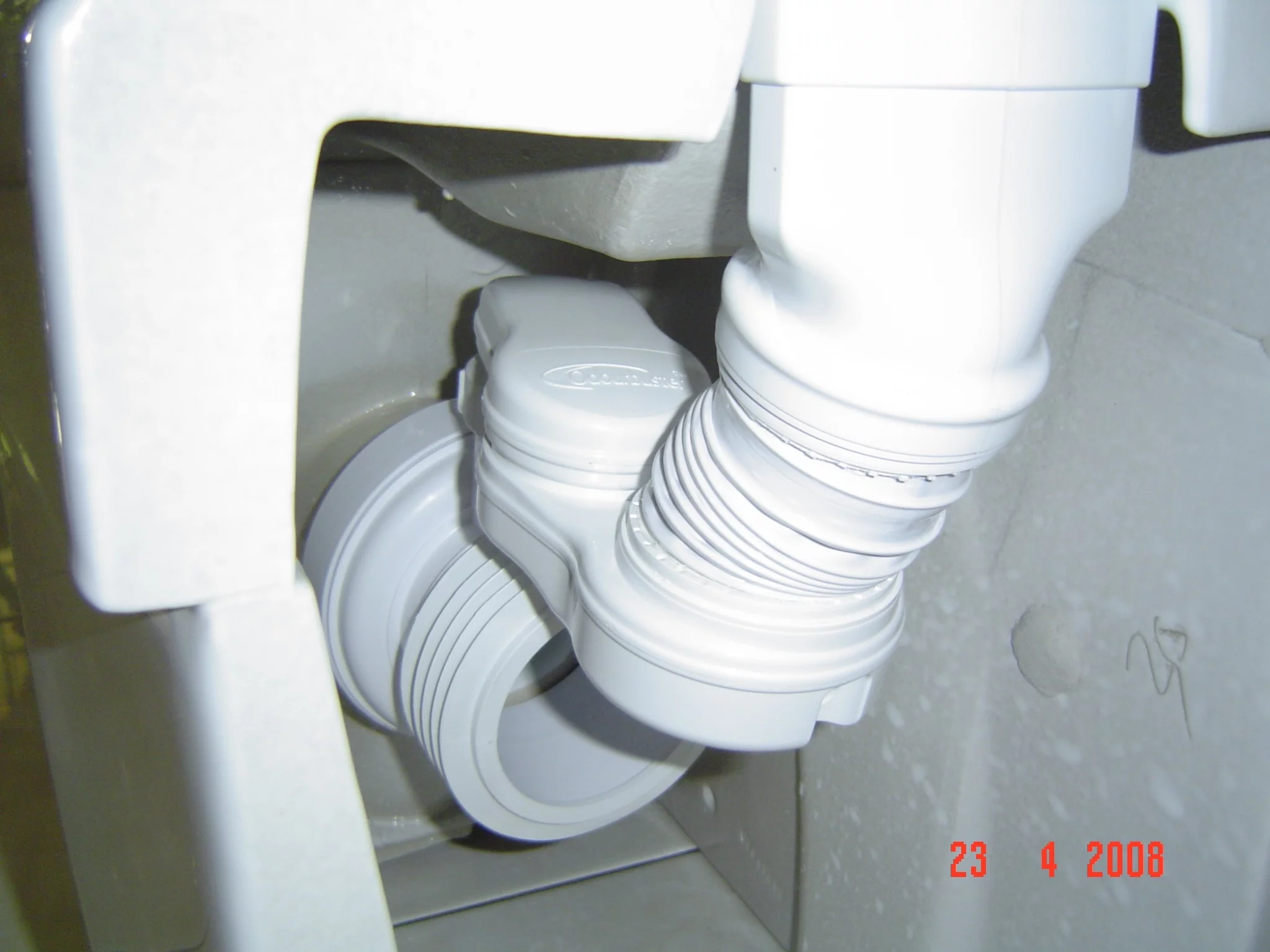 The Odourbuster, mounted on the back of a toilet