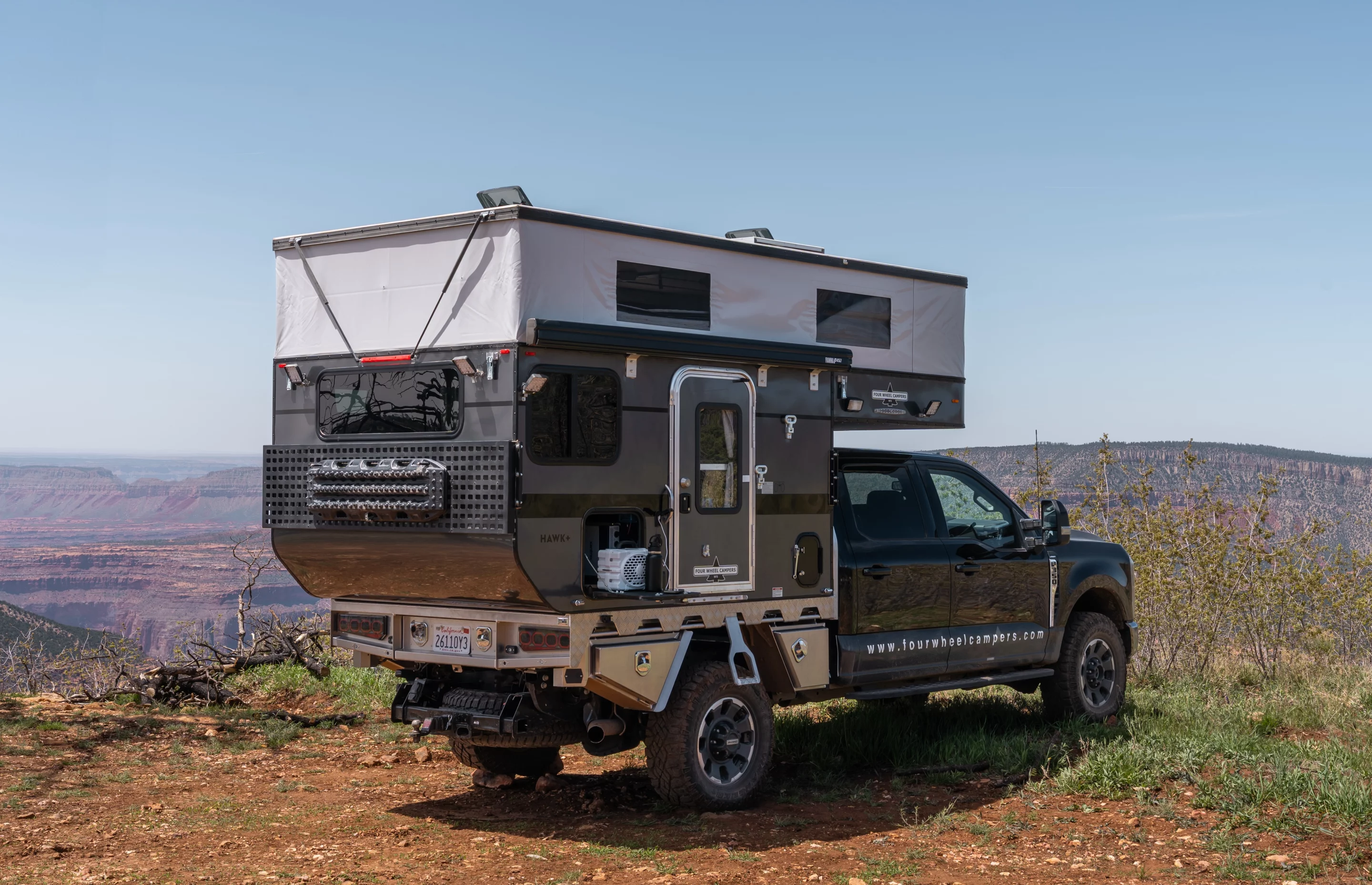 A pop-up truck camper like the Four Wheel Hawk+ is a great means for finding those quiet, remote camping spots with utterly amazing views