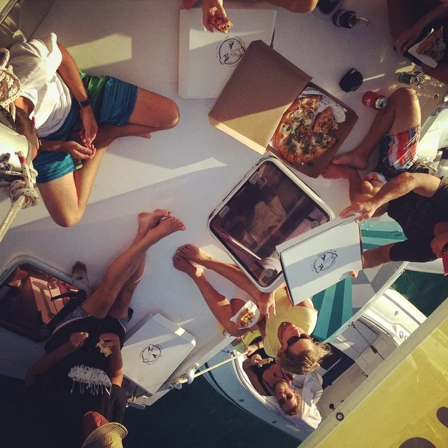 Enjoying the perks of a floating pizzeria