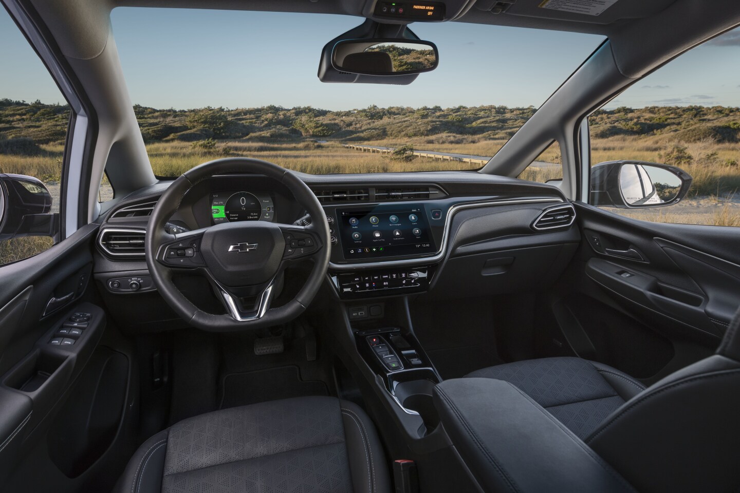 The center console gets much flatter as the gearshift lever is replaced with push buttons and pull tabs