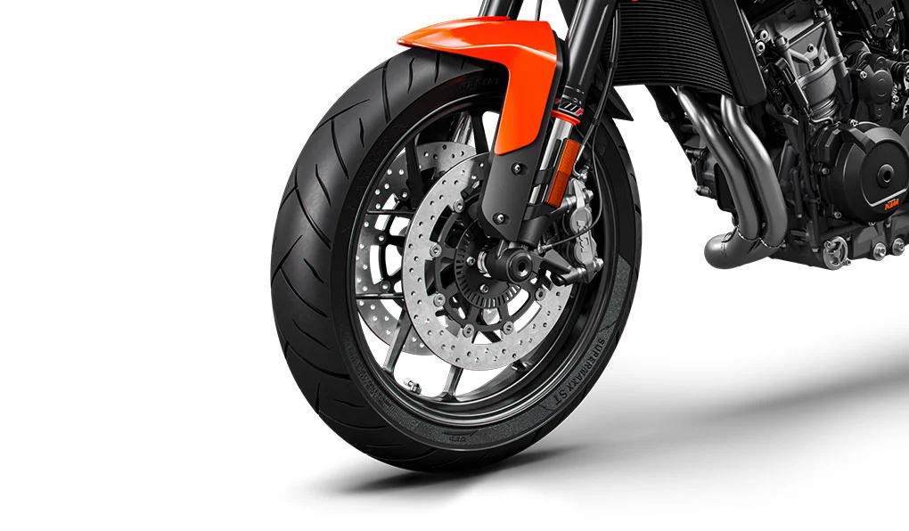 Stopping power is provided by 300mm twin floating discs and 4 piston calipers on the front and a single disc with two piston caliper on the rear. Lean sensitive ABS is fitted as standard