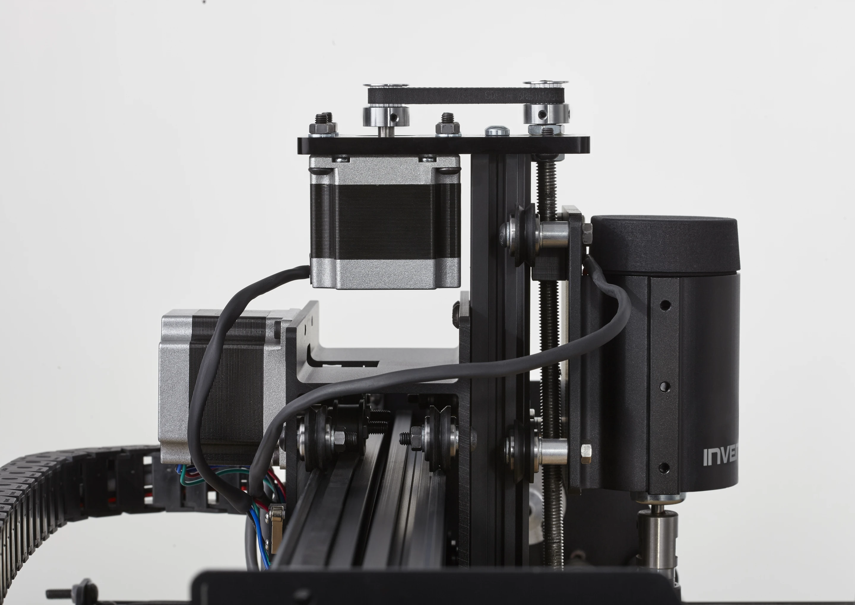 A close-up of the X-Carve carriage, with the cutter motor on the right