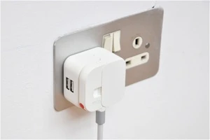 The adapter with three Folding Plugs takes barely more room than a standard UK plug (Credit: Min-Kyu Choi)
