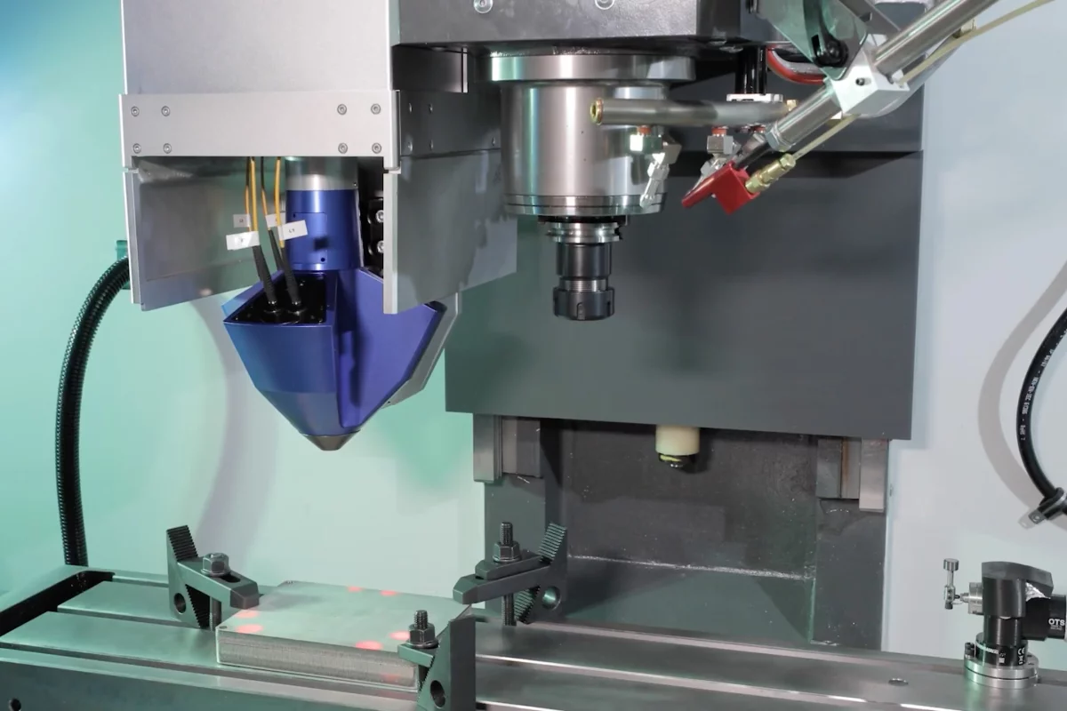 Mounted to an existing CNC milling machine, the Meltio Engine can add or remove metal in five-axis precision, creating full-density finished production parts, or augmenting or repairing existing parts