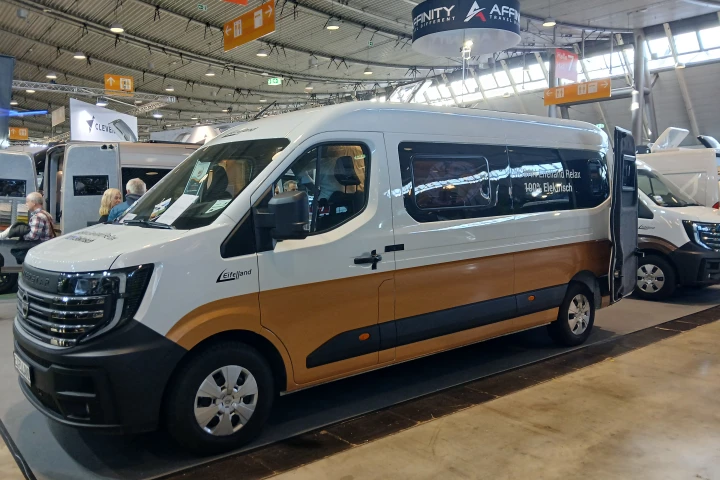 This white and brown mustard Nissan Interstar-e may not look it from outside but is a warm, woodsy lodge ready to explore the world