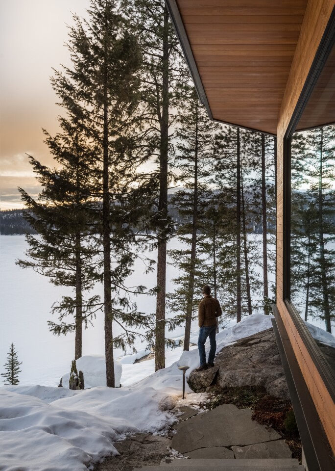 The Cliff House sits on property that features discrete rocky walkways that wind down to the lakeshore