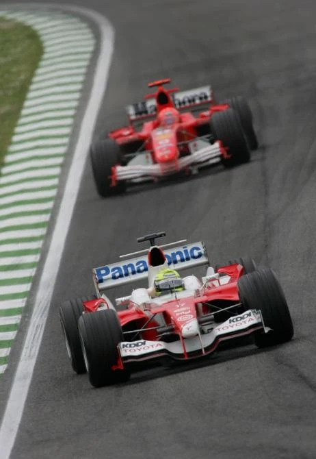 Ralf leads brother Michael in the early stages of the race - once free of traffic, the elder Schumacher unleashed one of the most blistering turns of speed ever witnessed on a Grand prix circuit