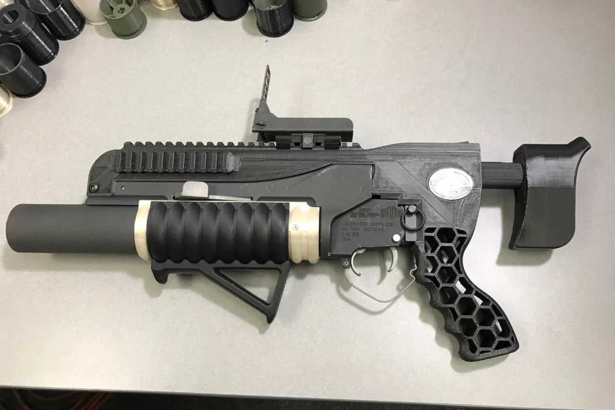 The additive-manufactured RAMBO system includes an NSRDEC-designed standalone kit with printed adjustable buttstock, mounts, grips and other modifications