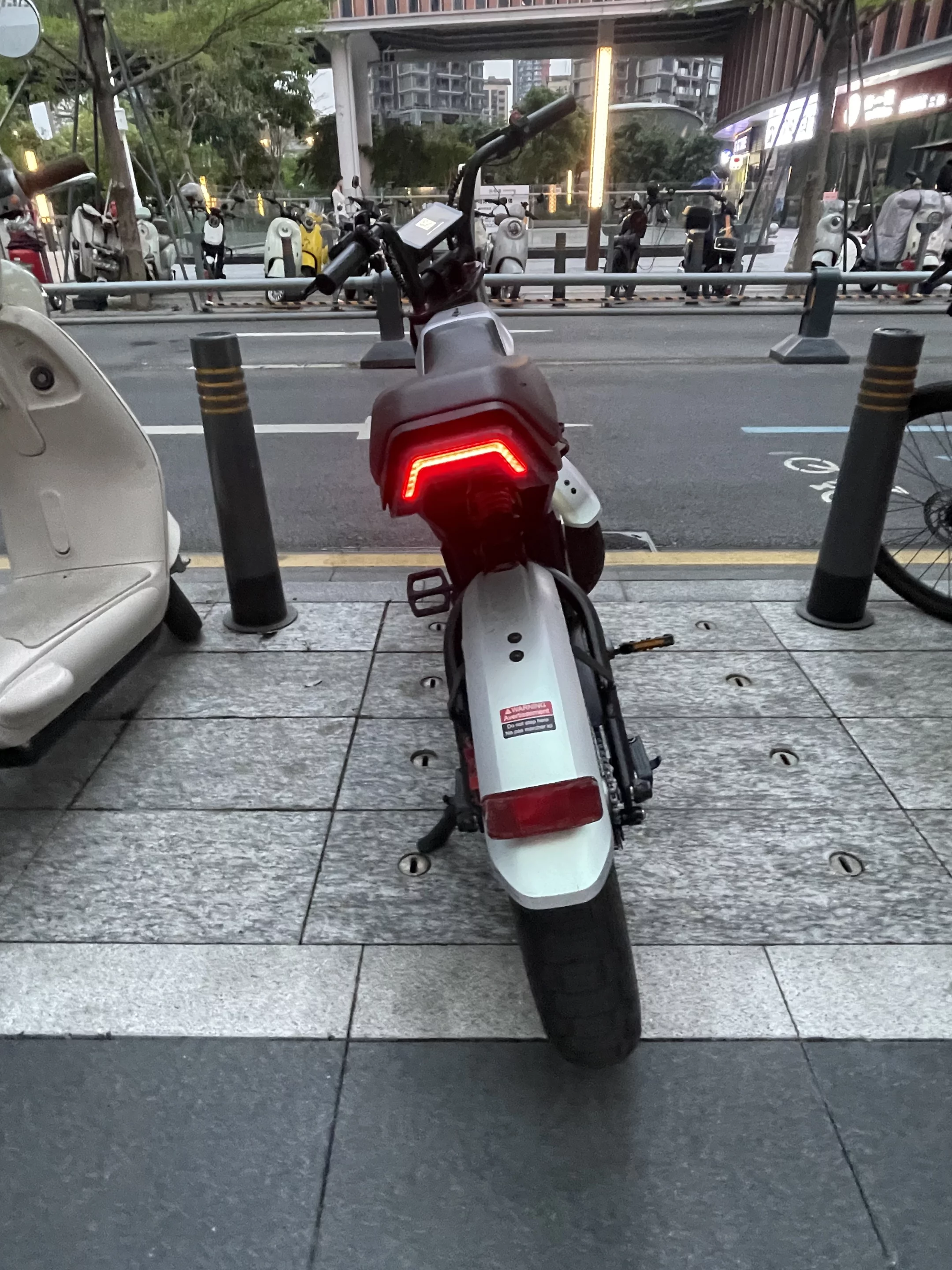 The bike is also much easier to squeeze into tight parking spots (and roomy ones like this)