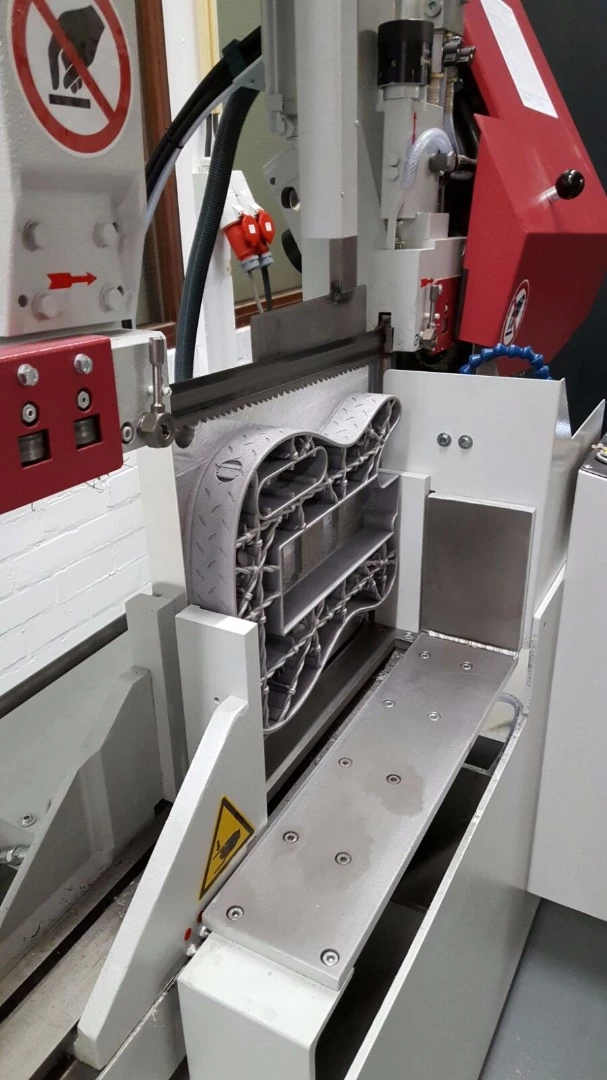 The printed body had to be separated from the base plate using a saw