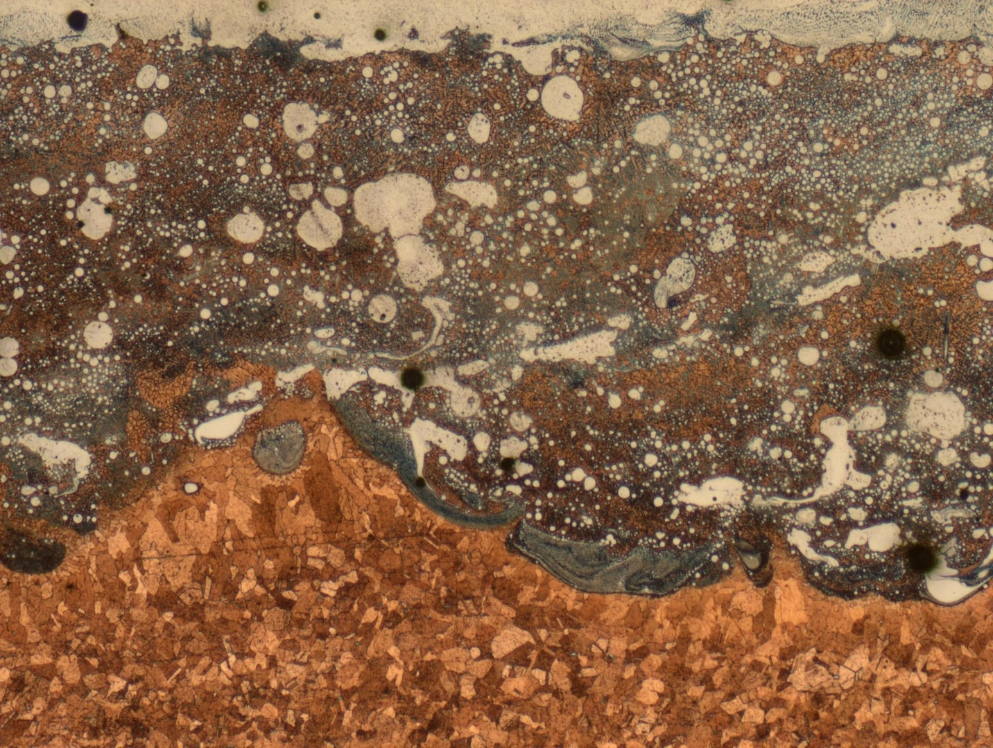 An image from a microscope reveals how the two metals, copper alloy and Inconel, mix and interlock to form a strong bond created by the innovative 3-D printing process during manufacturing of the igniter prototype