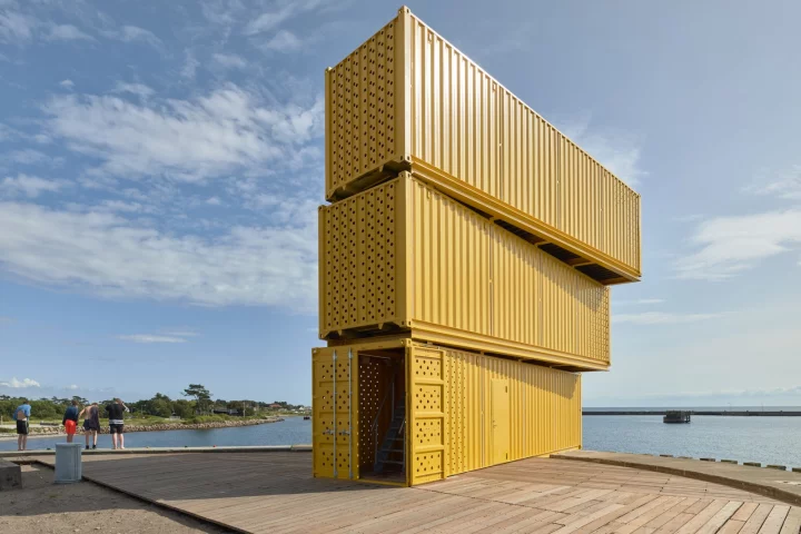 The Water Sports Center Halsskov's diving tower is made from three stacked shipping containers