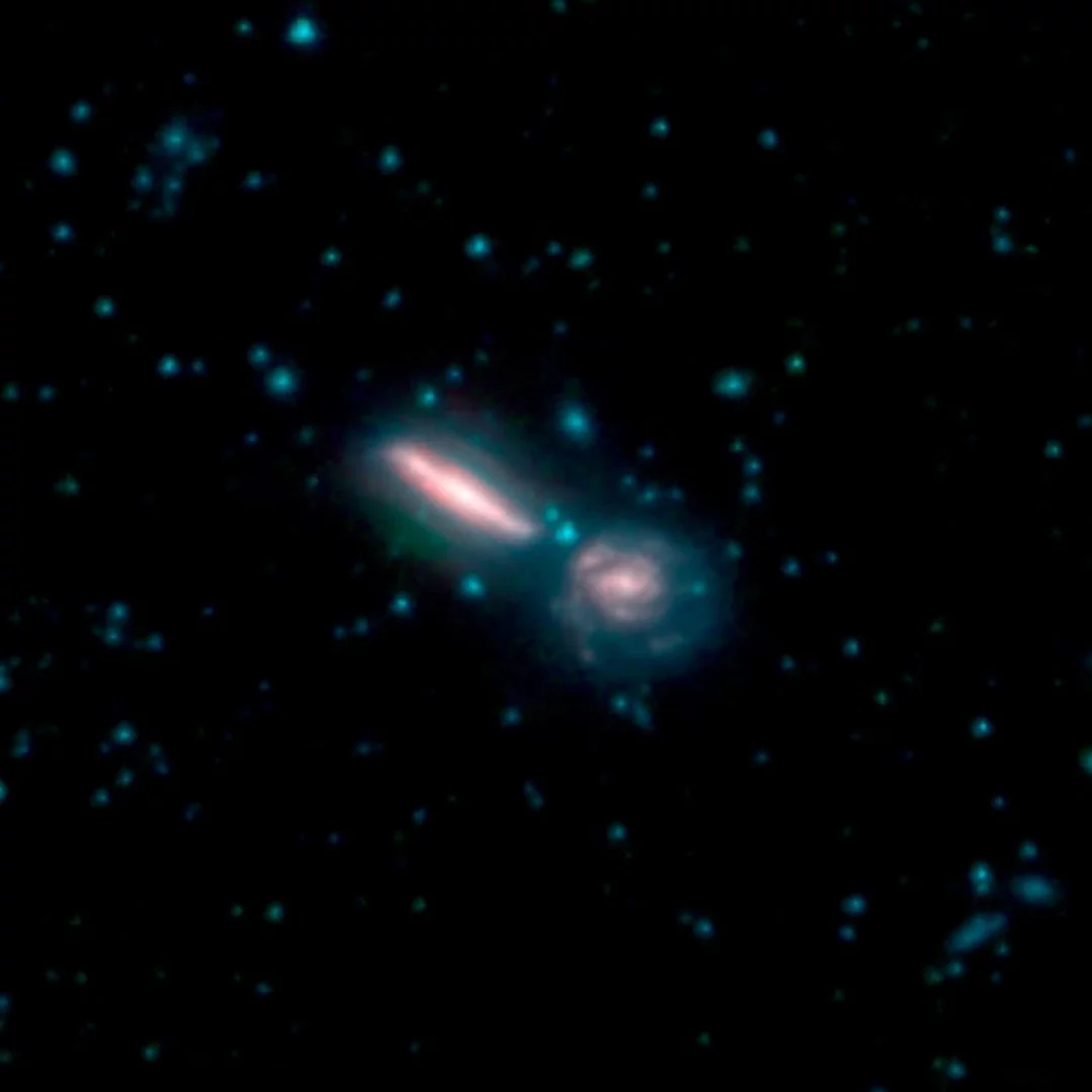 Two merging galaxies known as Arp 302, also called VV 340