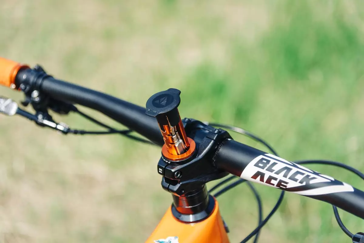 The Stash Multi-Tool slides down inside the steer tube when not in use