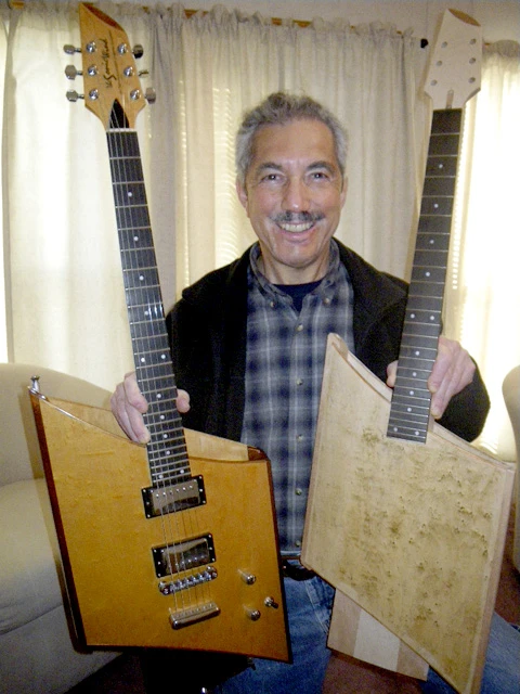 Hector Trevino with his open chamber No1 and No2 Sonic Wind guitars