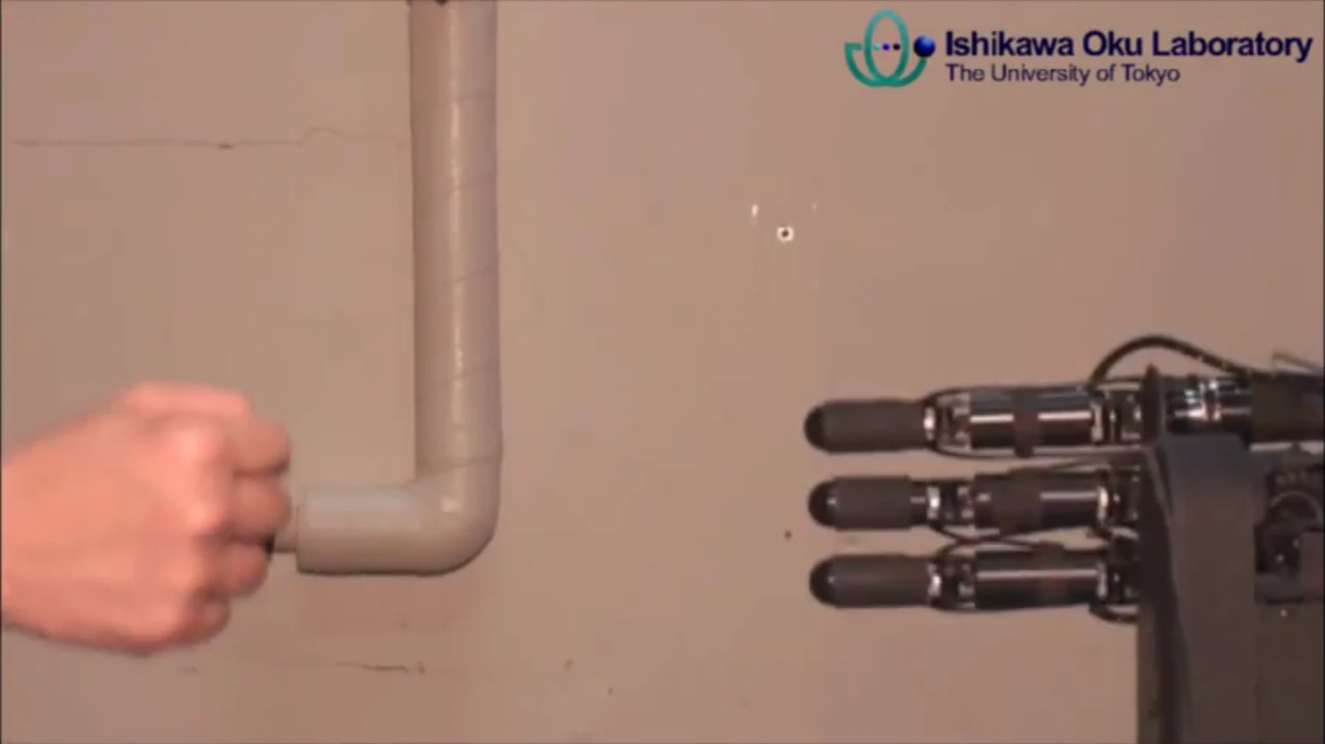 Strictly speaking that should be robot hand and eye, since, as you might have guessed, it uses a high speed vision system that identifies, within a millisecond, the move being made by the human player from the shape of their hand