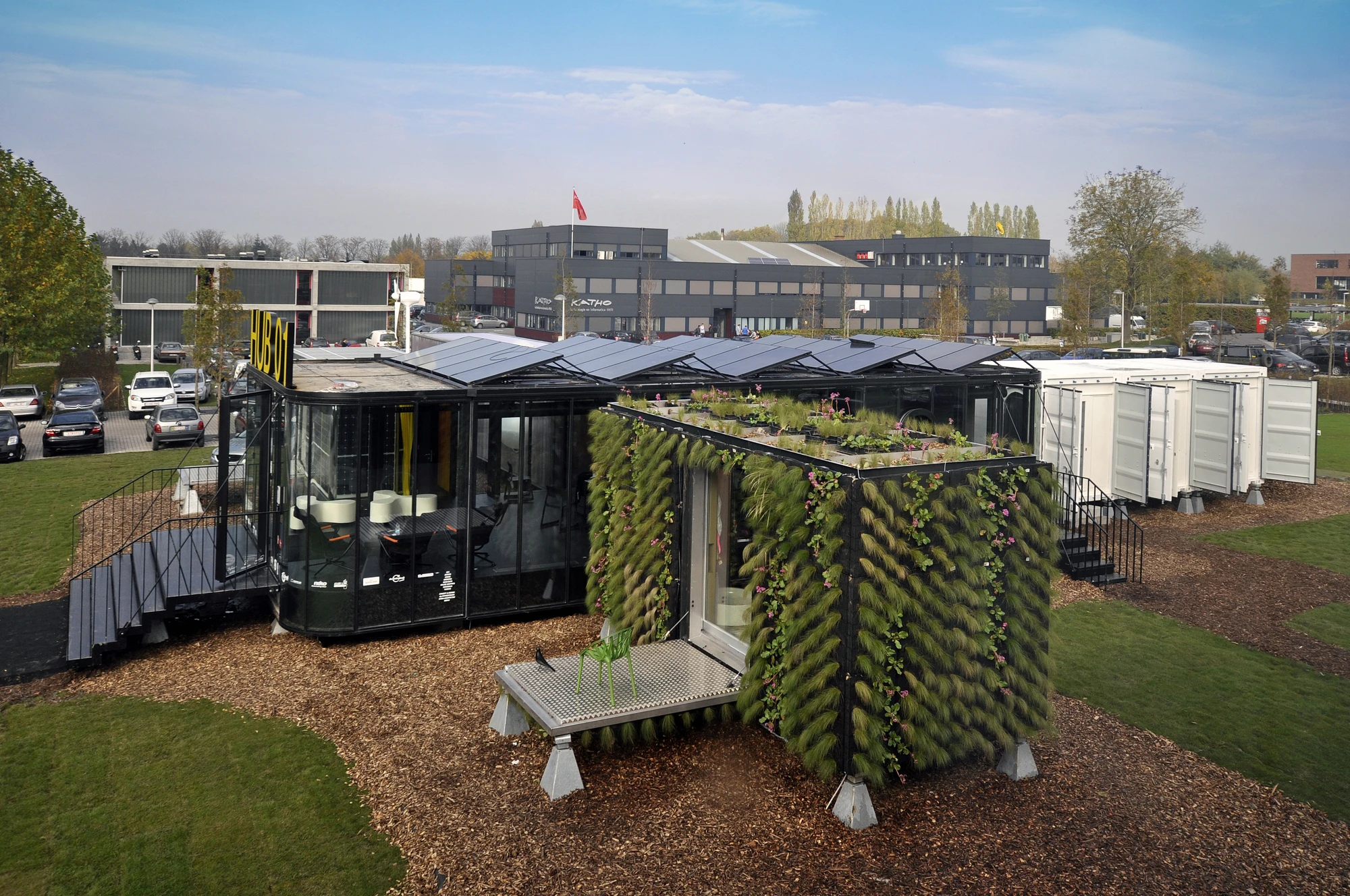Designed by architectural studios dmvA Architecten and A3 Architects, Hub_01 boasts several modern flexible living modules