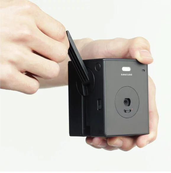 Pumping away at 100 - 150 turns per minute will give you about 60 seconds worth of power or between 4-8 images