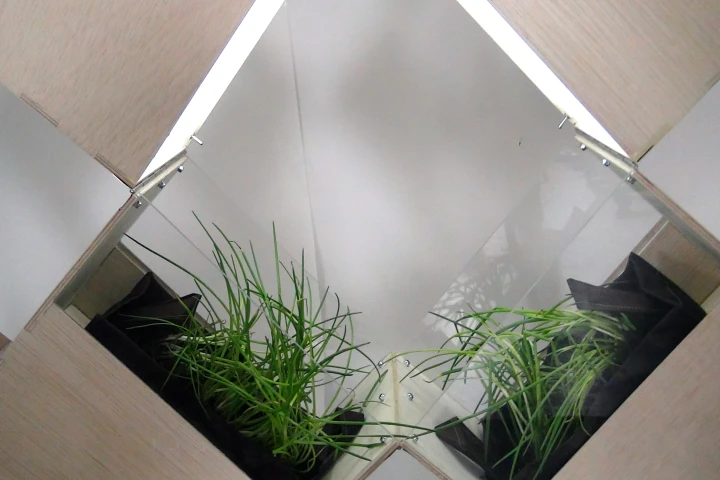 The herb garden components can slide in and out on tracks to help regulate growing conditions, and there's a low-energy LED lighting system on the underside of each cube