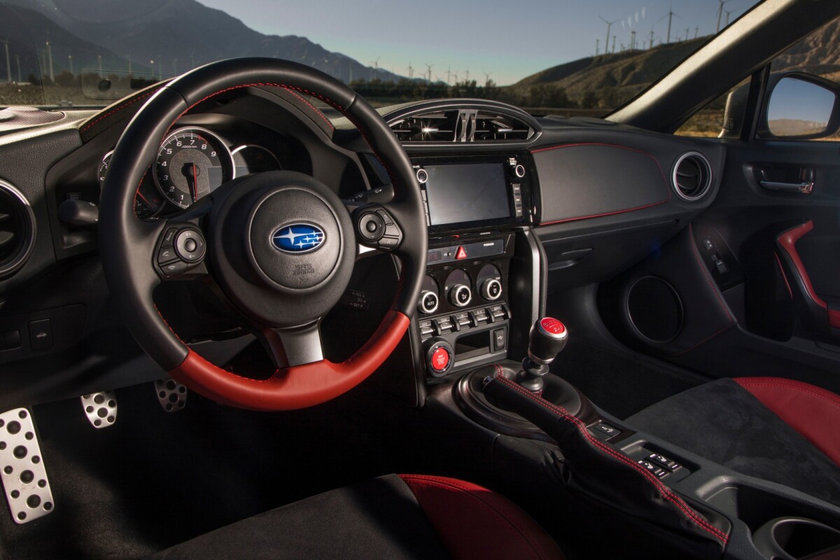 The interior of the 2018 Subaru BRZ tS is similar to a BRZ Limited model, but adds some tS logos stitched to the seats and red seatbelts