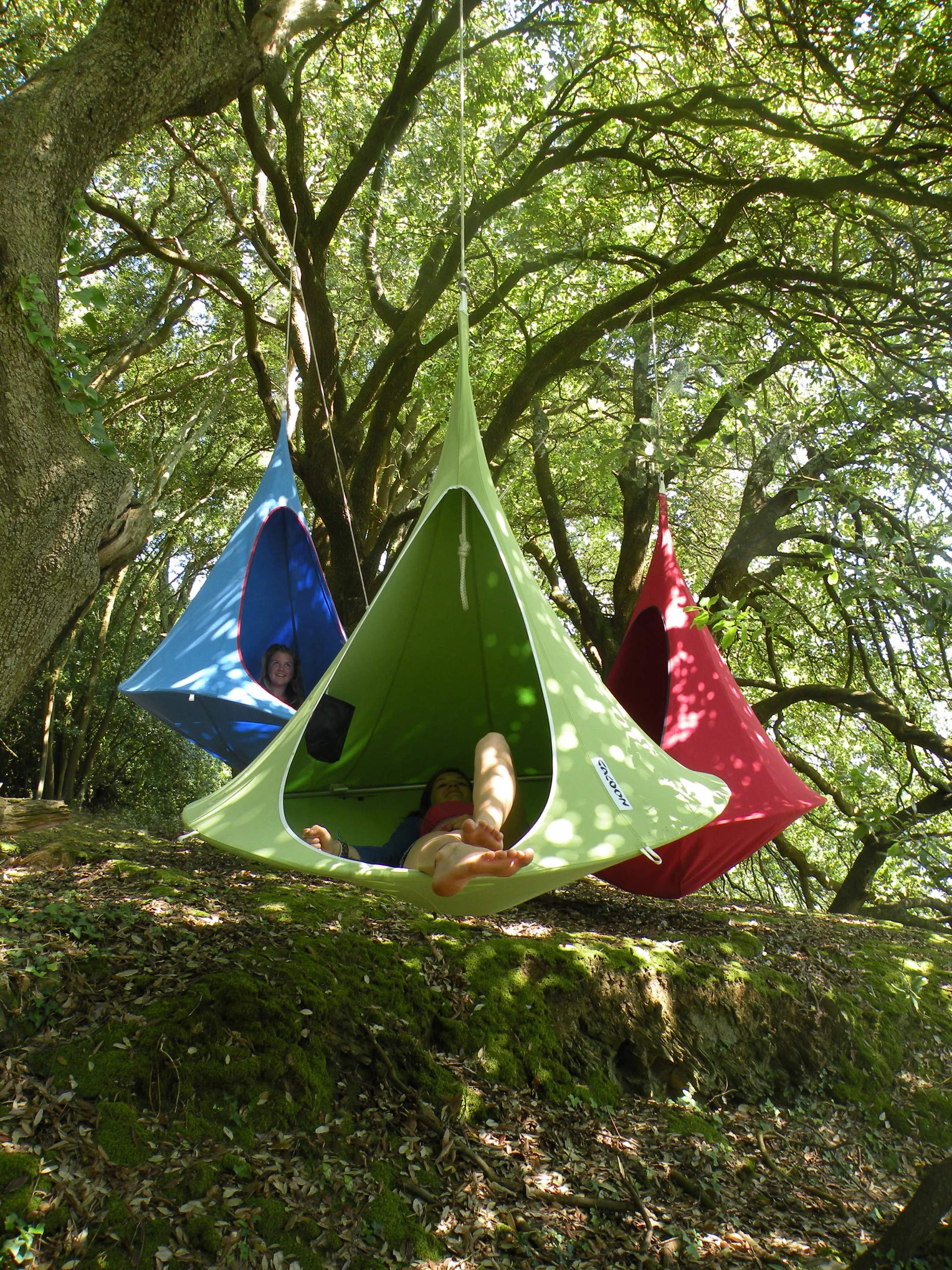 Cacoon is a hanging fabric treehouse designed for adults and children alike