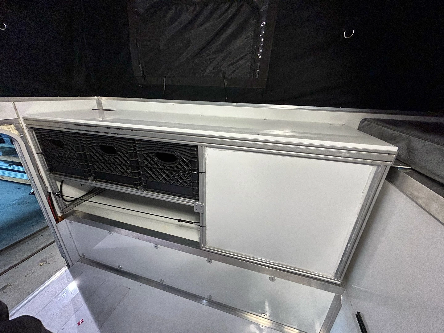 Buyers can add various storage shelf and cabinet designs for organizing their Stealth camper