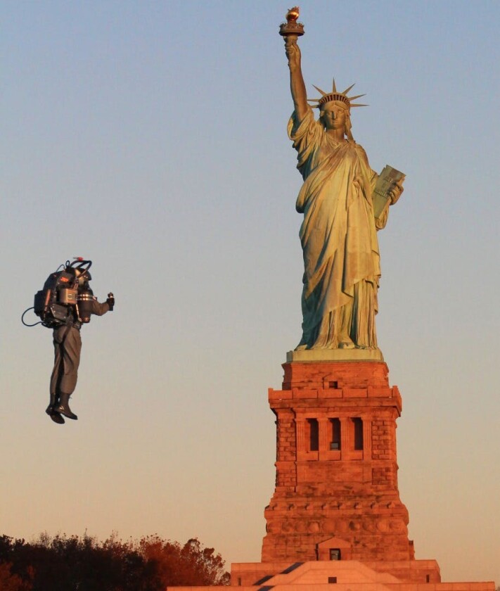 David Mayman flies around the Statue of Liberty
