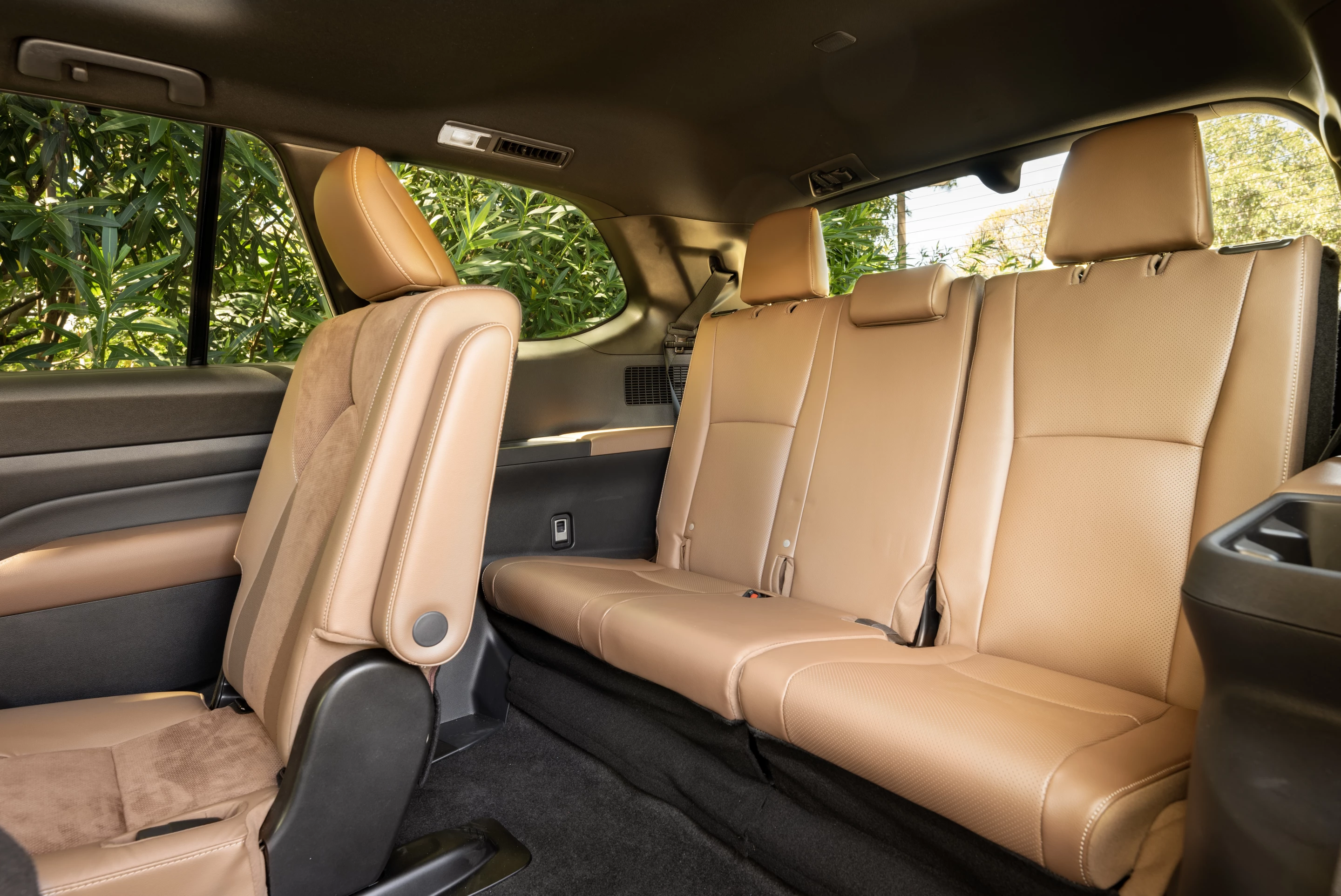 Third row seats in the Grand Highlander are elevated and have more legroom than those found in the standard Highlander
