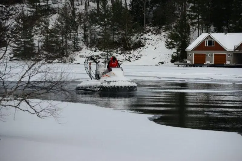 The AirRider hovercraft traveling over open water and ice