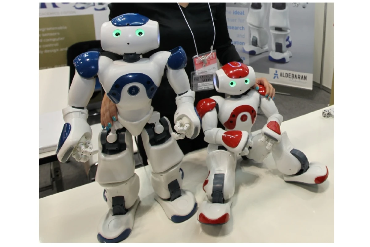 Nao - he sees, can find a ball, recognizes different touches from humans and communicate via Wi-Fi