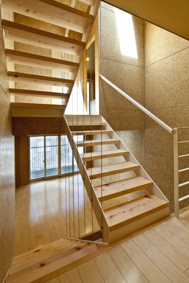 A wooden stairway runs up the center of the house (Photo: Stirling Elmendorf)