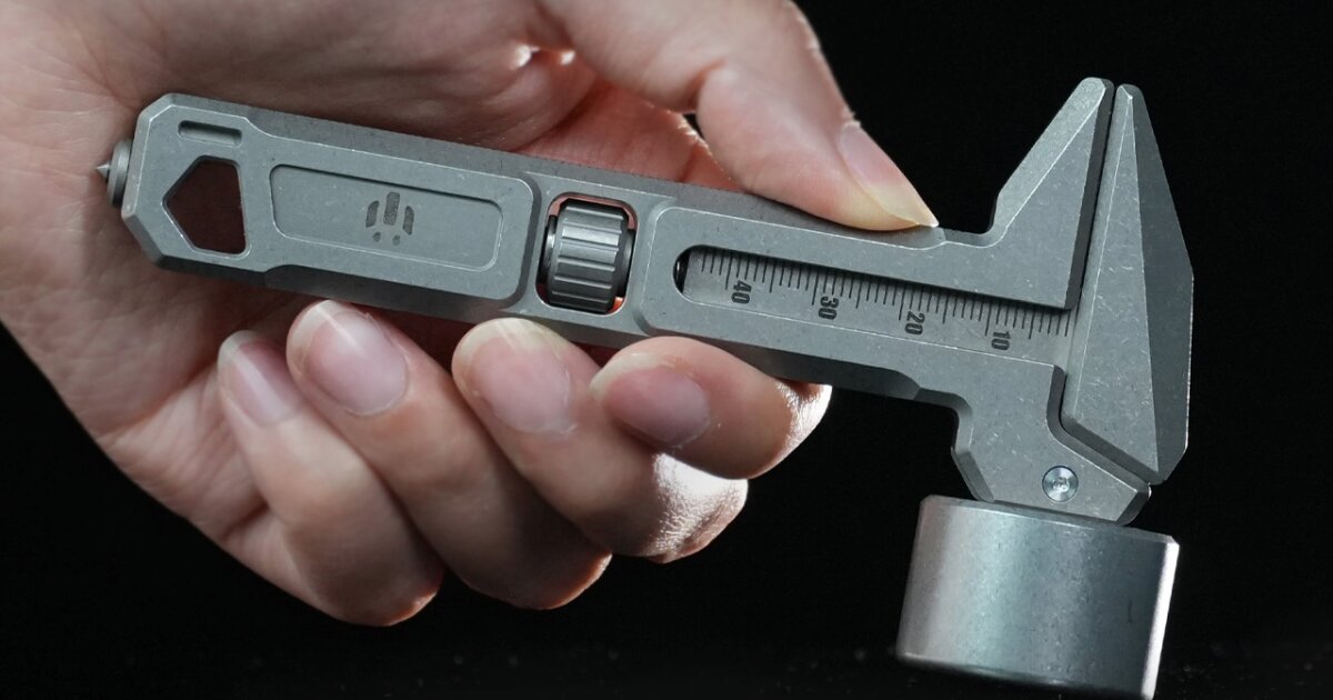 Titanium multitool combines a steel-headed hammer with a wrench and rulers