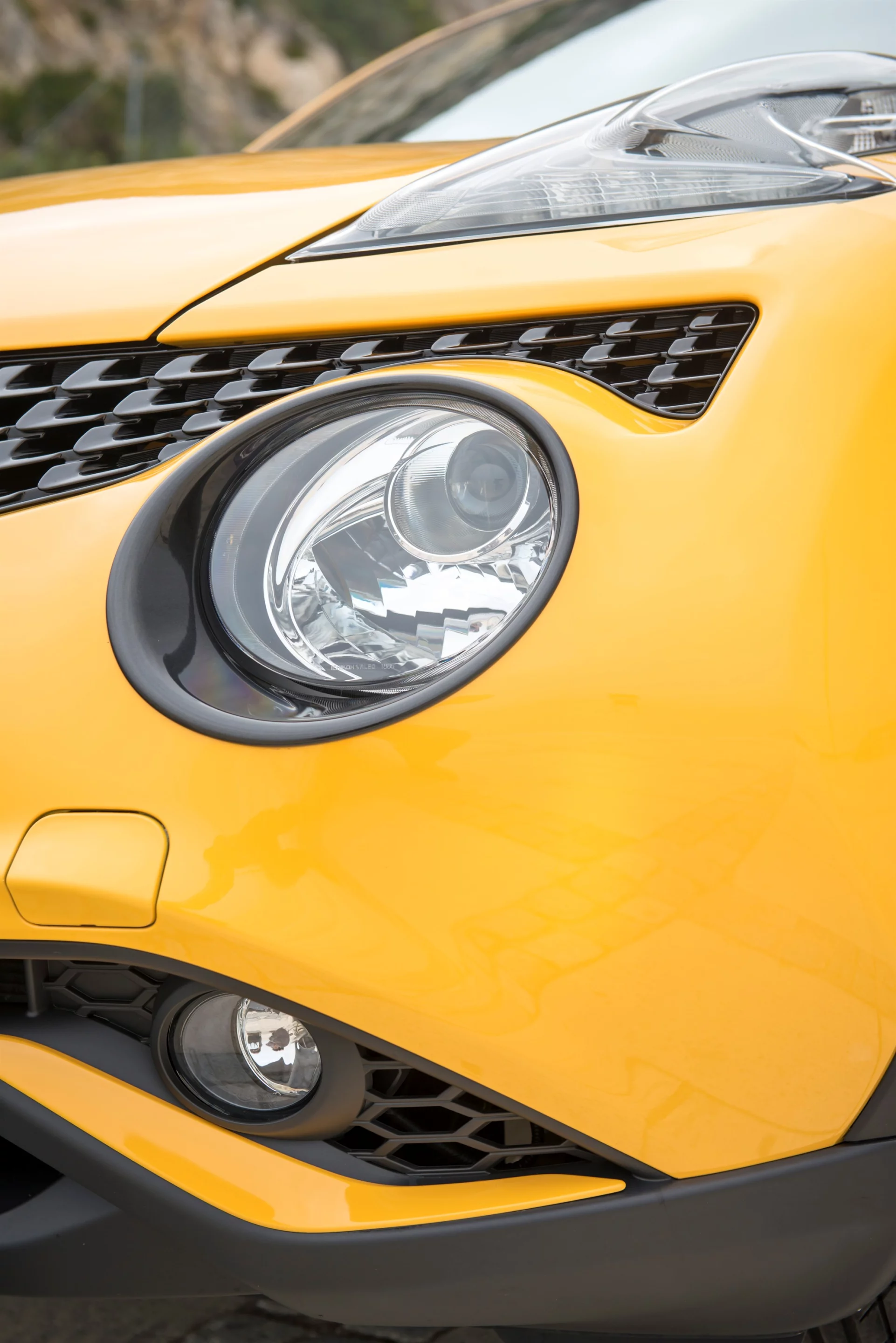 The Juke's signature grill and forward lighting have been revised for 2015