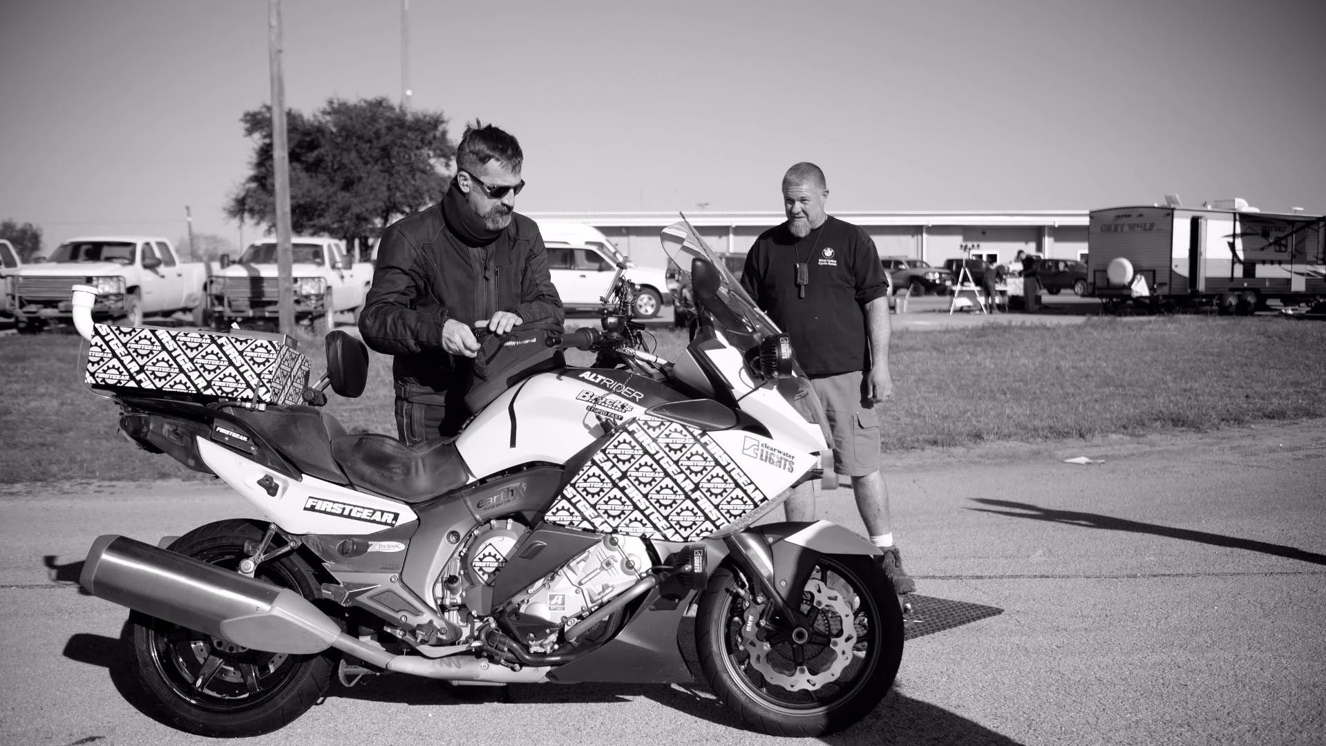 Carl Reese with his BMW on the day he set a Guinness-certified world record for longest distance in a single day